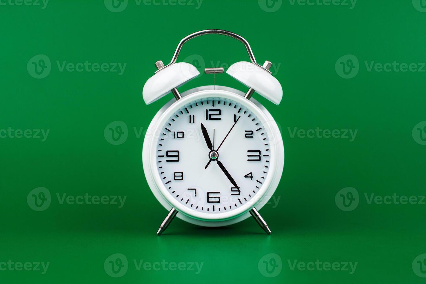 Stopping alarm clock, time concept and working with time and planning work with limited time photo
