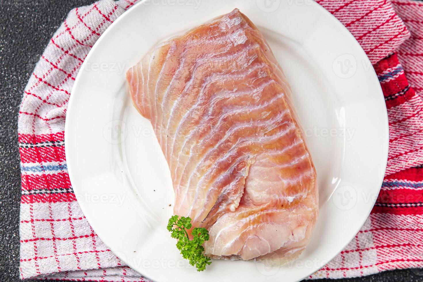 raw fish fillet seafood ready to cook natural fresh appetizer meal food snack on the table copy space food background rustic top view keto or paleo diet vegetarian food Pescetarian photo