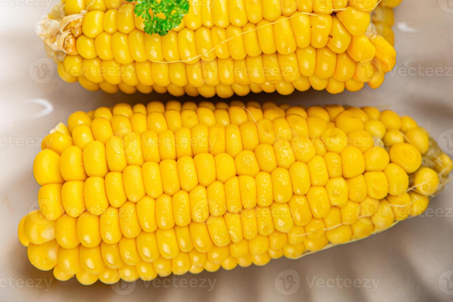 boiled corn cob natural food fresh appetizer meal food snack on the table copy space food background rustic top view keto or paleo diet vegetarian vegan photo