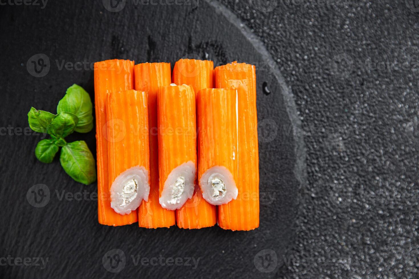 crab stick stuffing cream cheese and herbs natural fresh appetizer meal food snack on the table copy space food background rustic top view photo