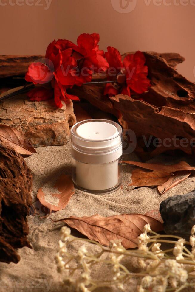 Luxurious Skincare Cream Jar with Red Flowers and Natural Elements photo