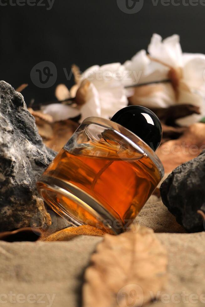 Elegant Amber Glass Bottle with Natural Backdrop photo