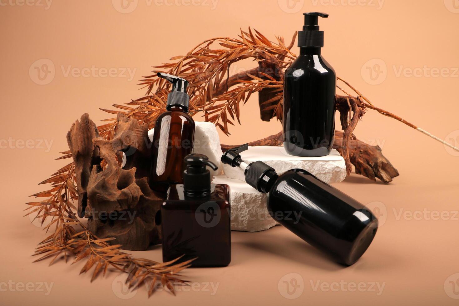 Assorted Black and Amber Pump Bottles on Rustic Natural Display photo