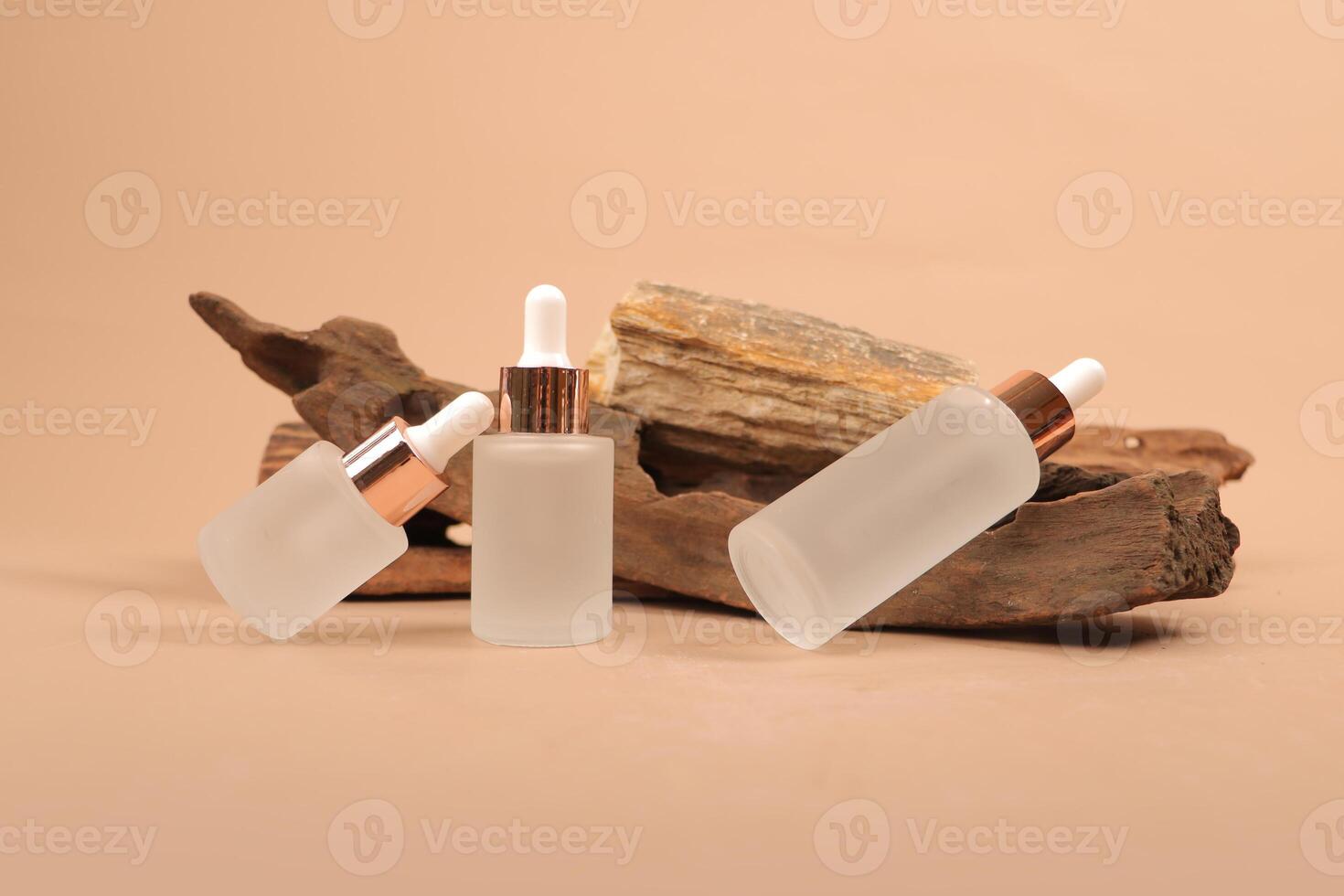 Elegant Frosted Glass Dropper Bottles with Rose Gold Caps for Skincare and Essential Oils photo