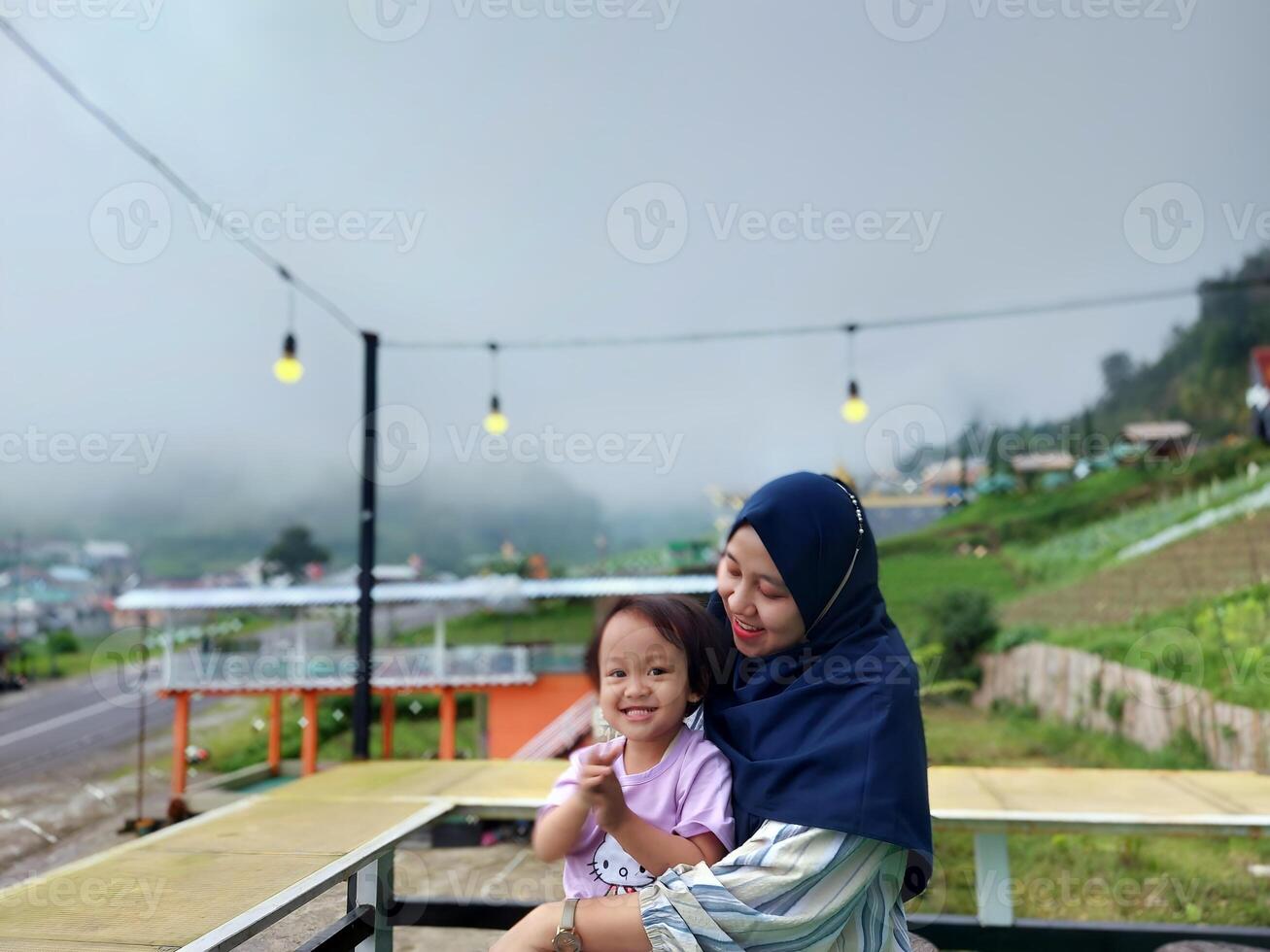 Holidays with family in the mountains, children and parents enjoy enjoying the holiday period, doing positive activities and having fun on Sundays photo