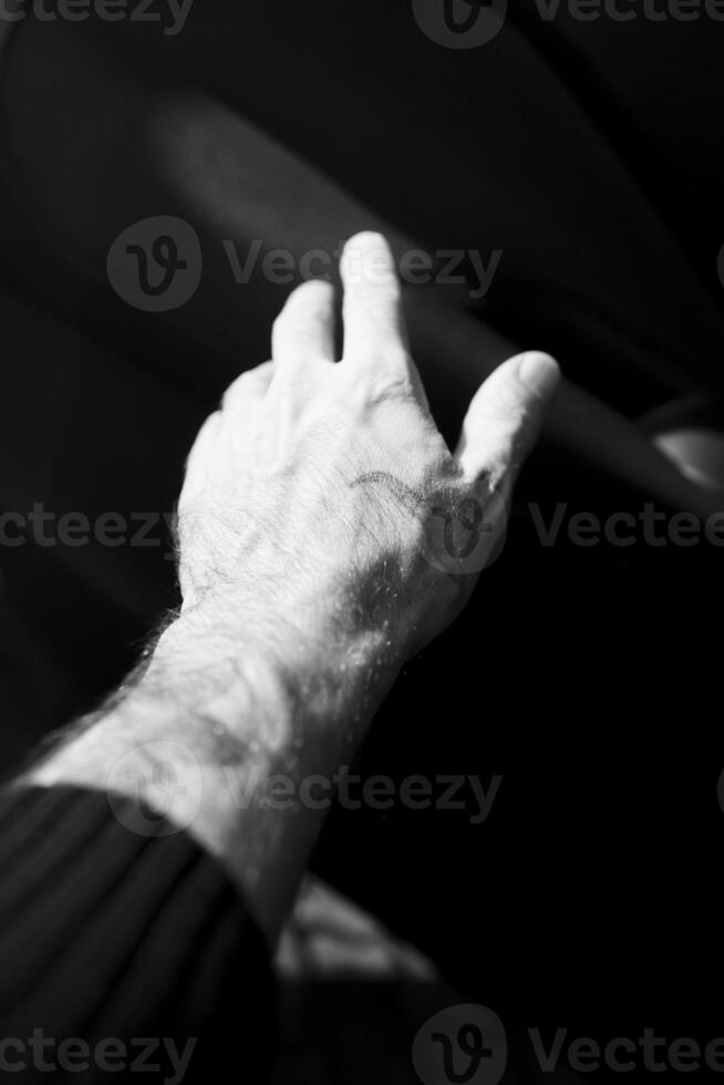 Conceptual image of hand isolated in natural light causing feeling of nostalgia photo