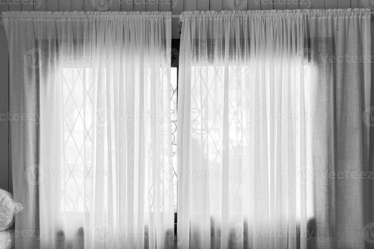 photograph of curtain in window of rustic and old house photo