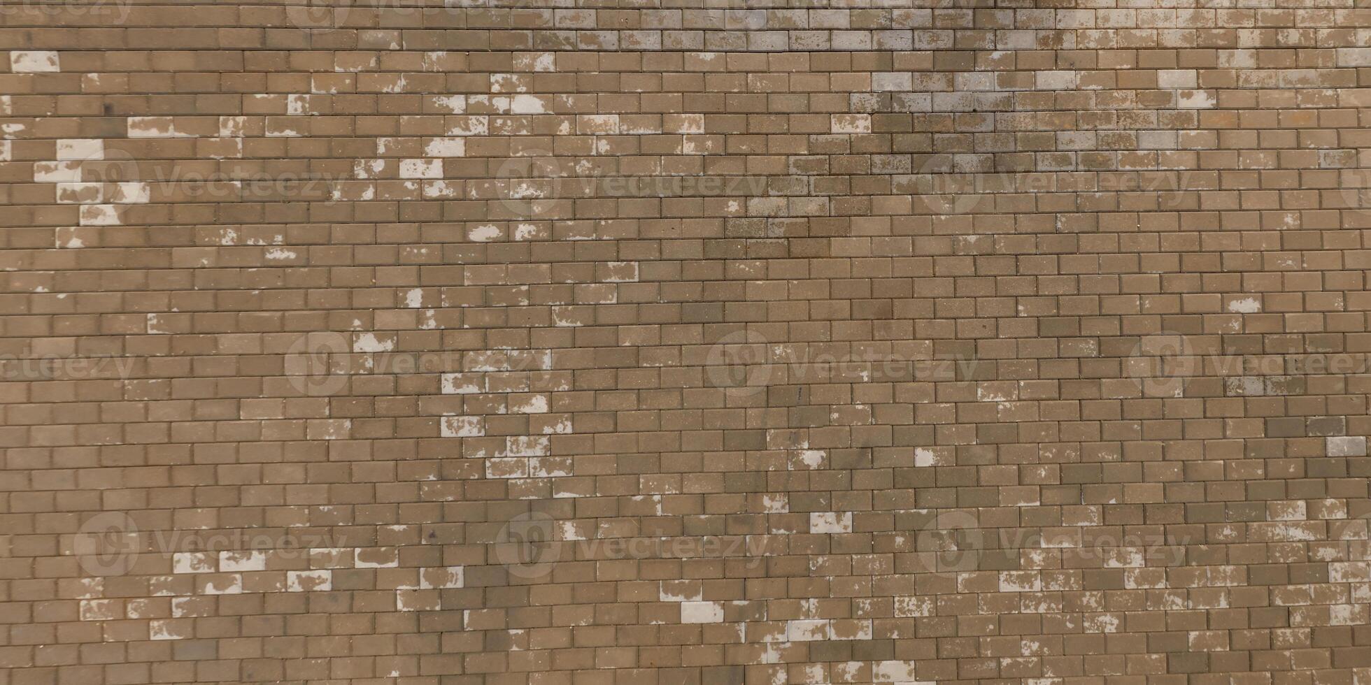 top view of the surface of wet paving slabs and pedestrian footpath after rain photo