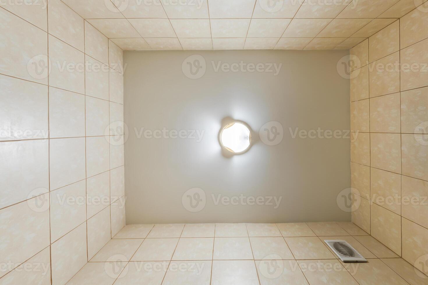 suspended ceiling with halogen spots lamps and drywall construction in empty room in apartment or house. Stretch ceiling white and complex shape. photo
