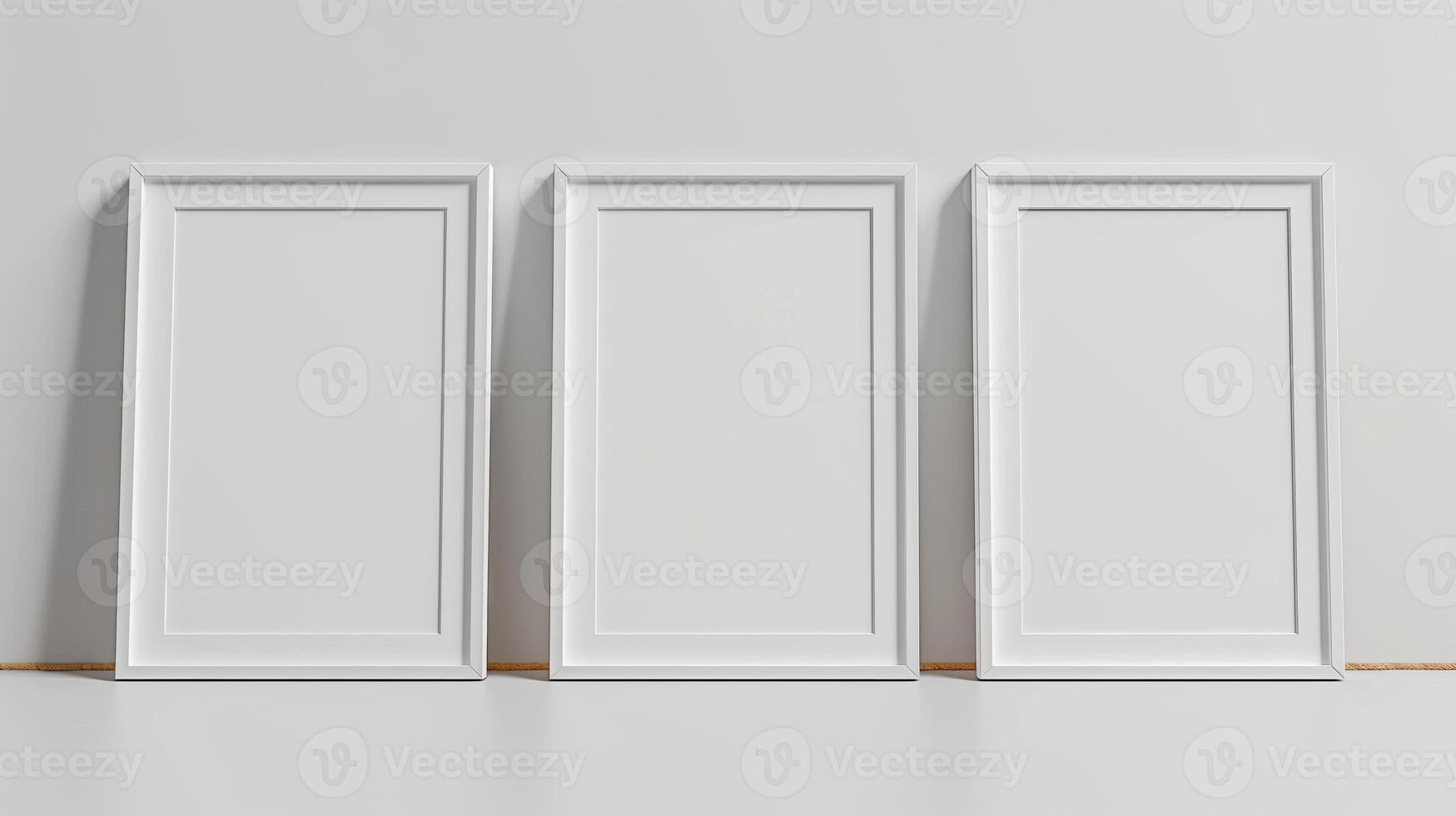 Front view of three white minimalistic picture frames on a light background. photo