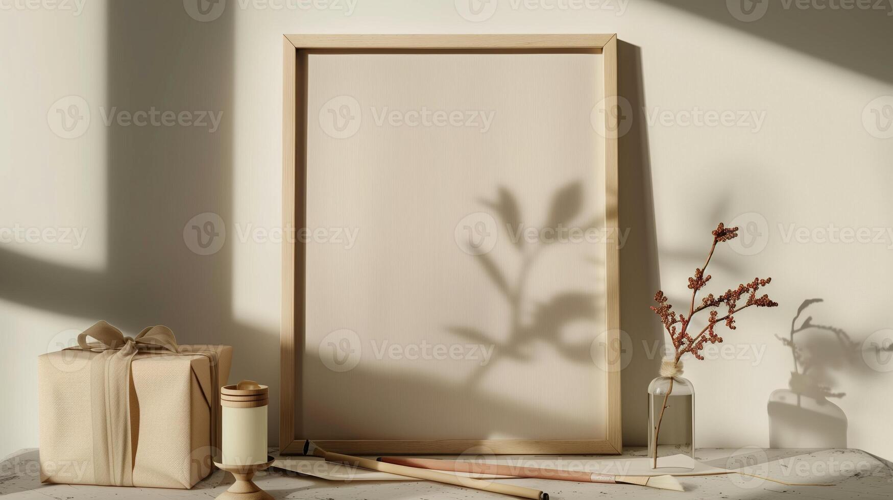 An empty frame mock up on a table next to the gift box. photo