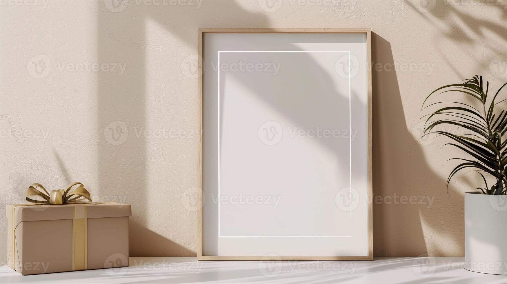 An empty frame mock up on a table next to the gift box. photo