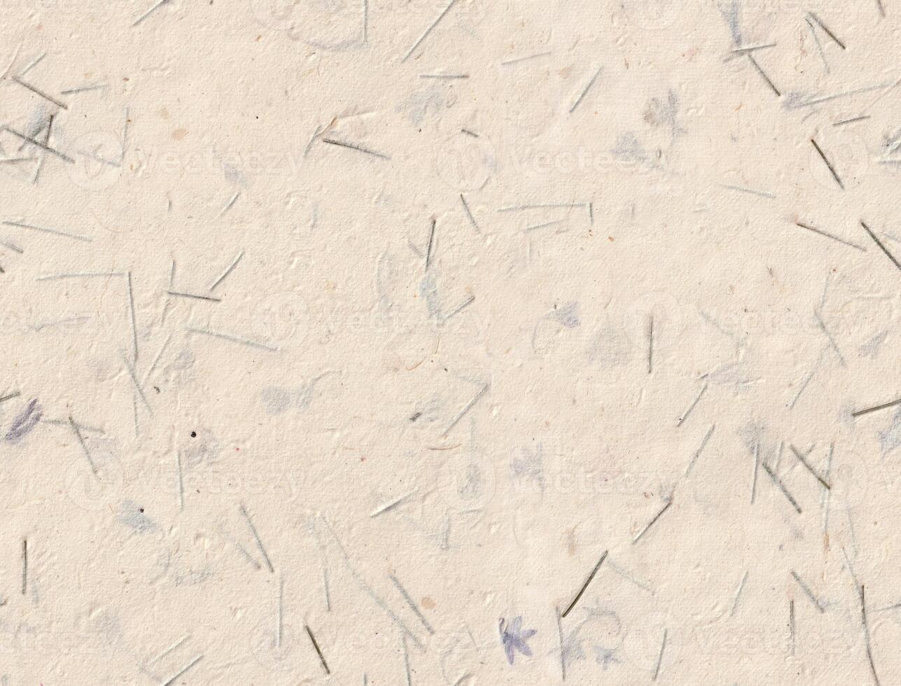 Himalayan Cornflower petals paper texture. Seamless handmade blue flowers with reeds craft recycled paper background surface for calligraphy artwork. 55gsm photo