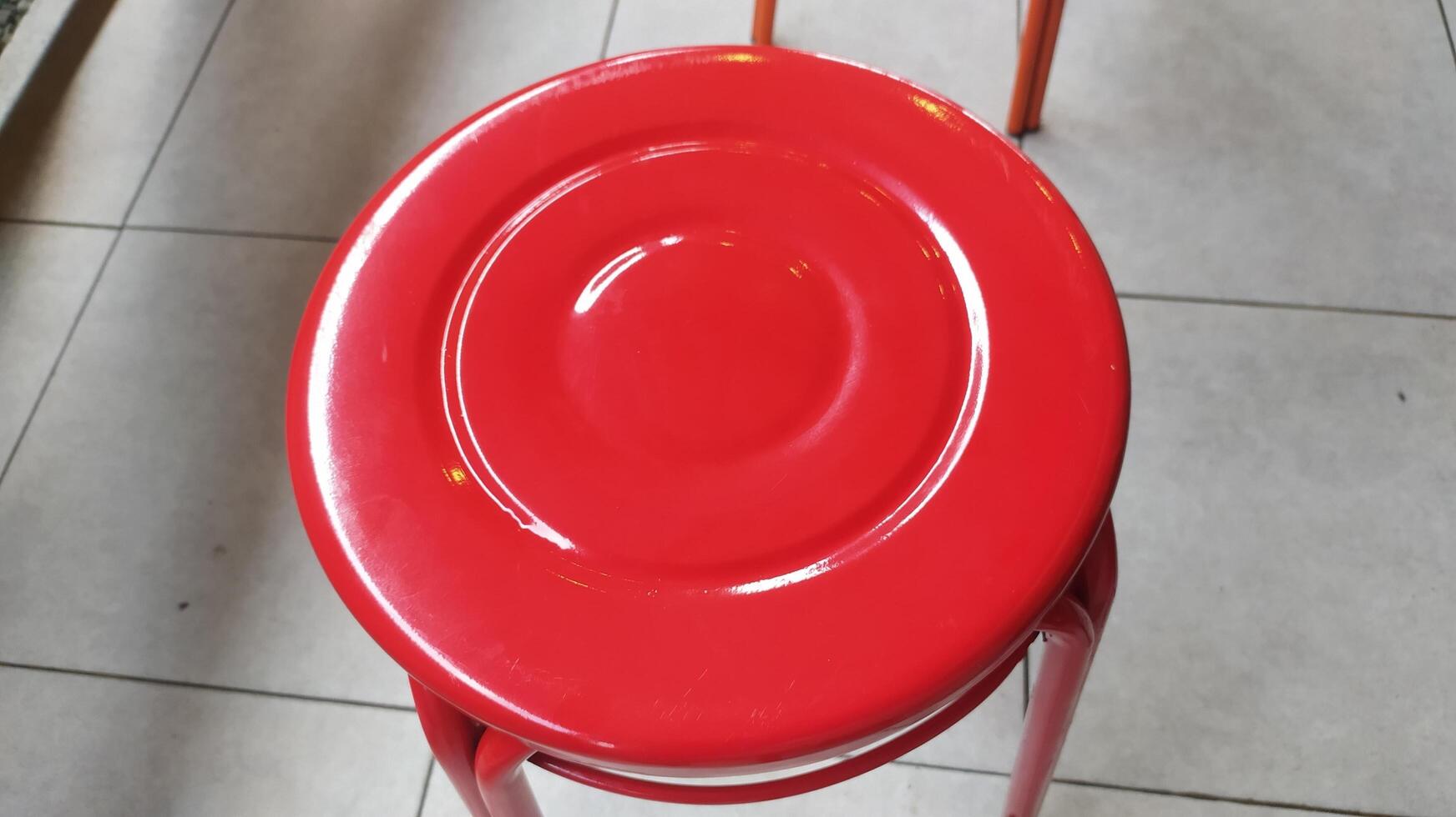 the top surface of a red dining chair photo