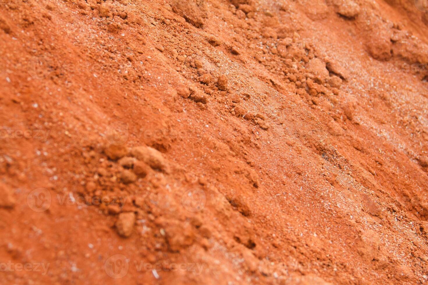Red clay used as a handicraft material, clay background photo
