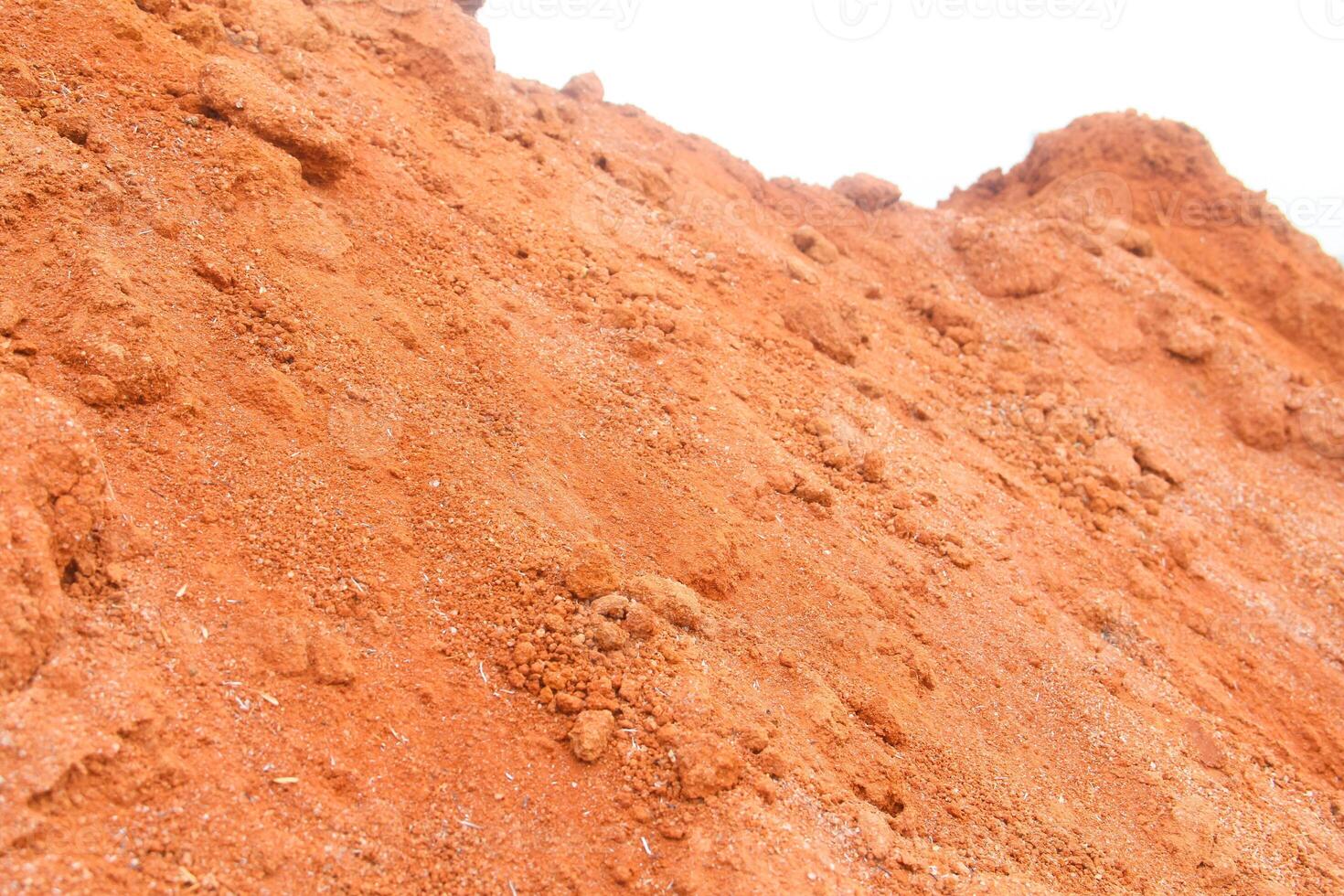 Red clay used as a handicraft material, clay background photo