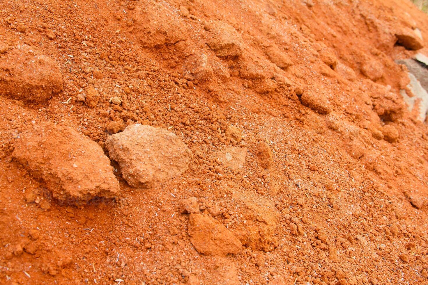 Red clay used as a handicraft material, clay background photo