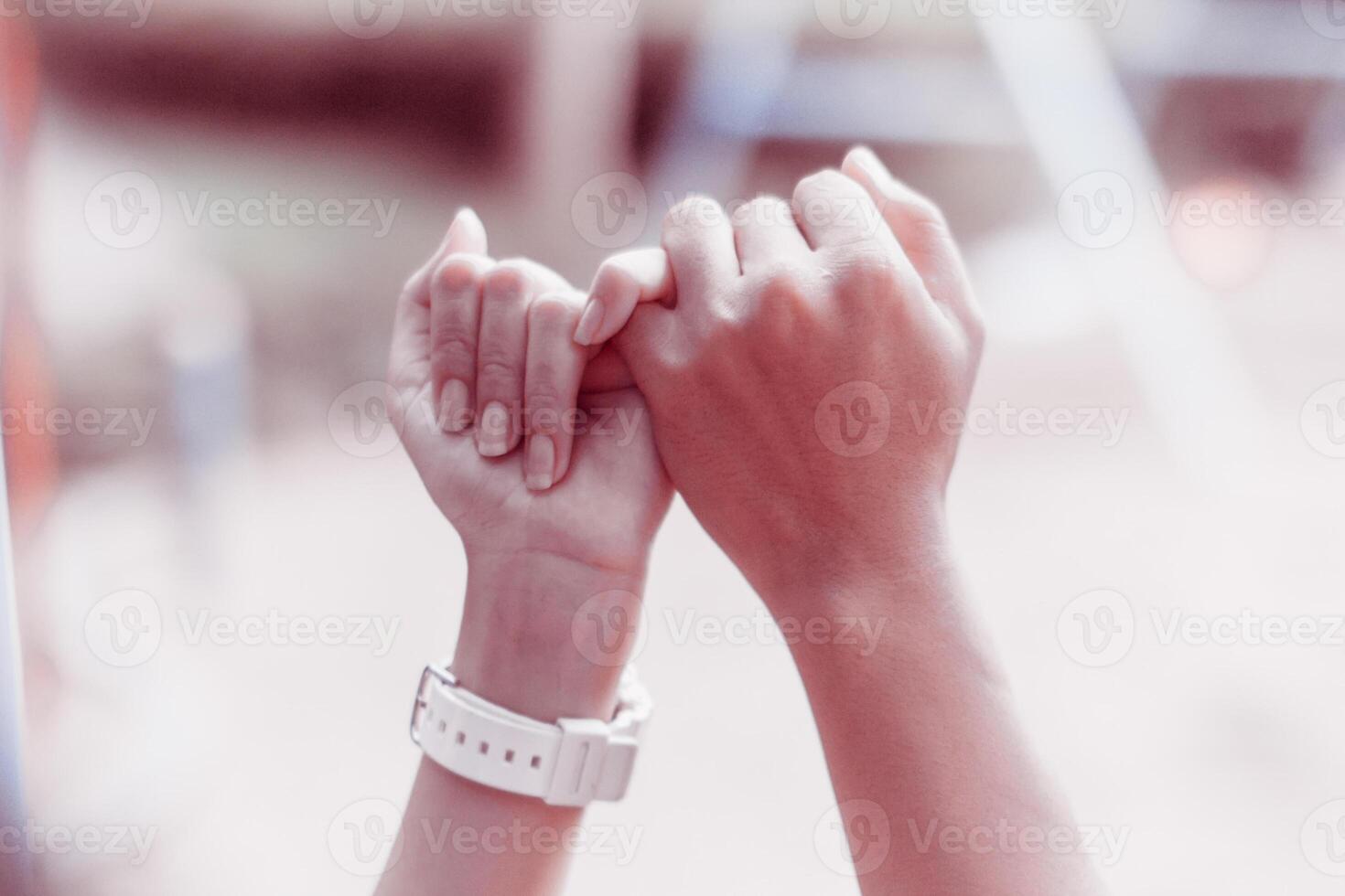 Couples hold hands show friendship love and kindness they have always shown each other and couples can be confident in their love for each other at all times. Background couple holding hands in love photo