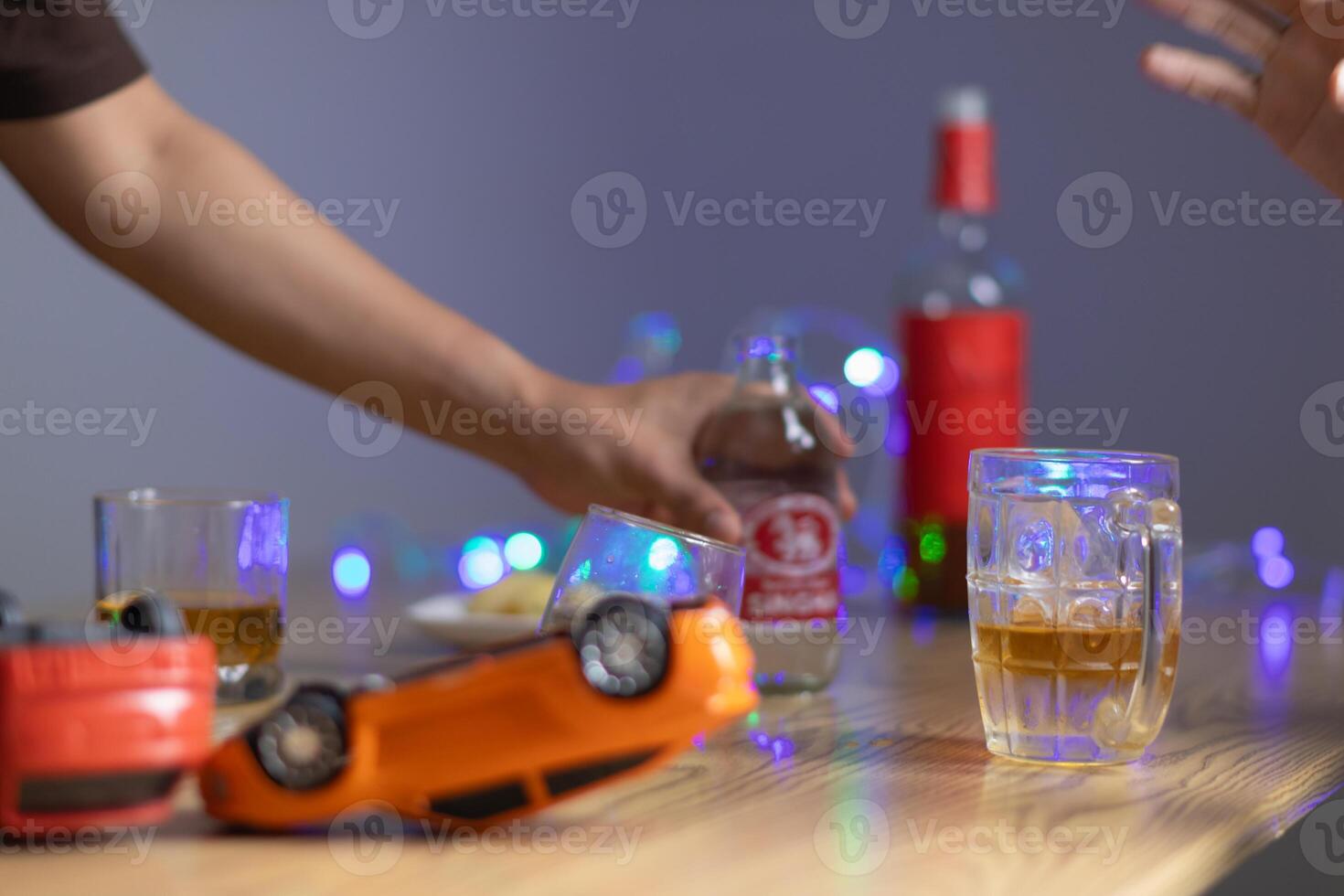 Alcoholic drinks were in goblets and placed on tables within party. Alcohol was consumed by drinkers within party before departed. drinking alcohol in moderation and campaigning against drunk driving. photo
