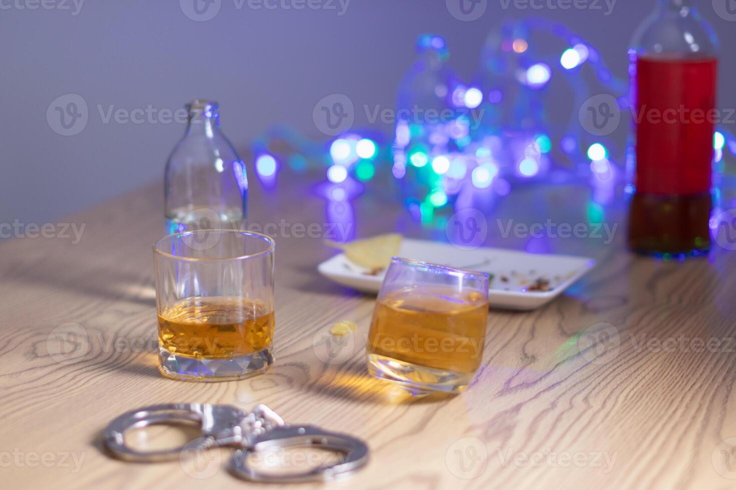 Alcoholic drinks were in goblets and placed on tables within party. Alcohol was consumed by drinkers within party before departed. drinking alcohol in moderation and campaigning against drunk driving. photo