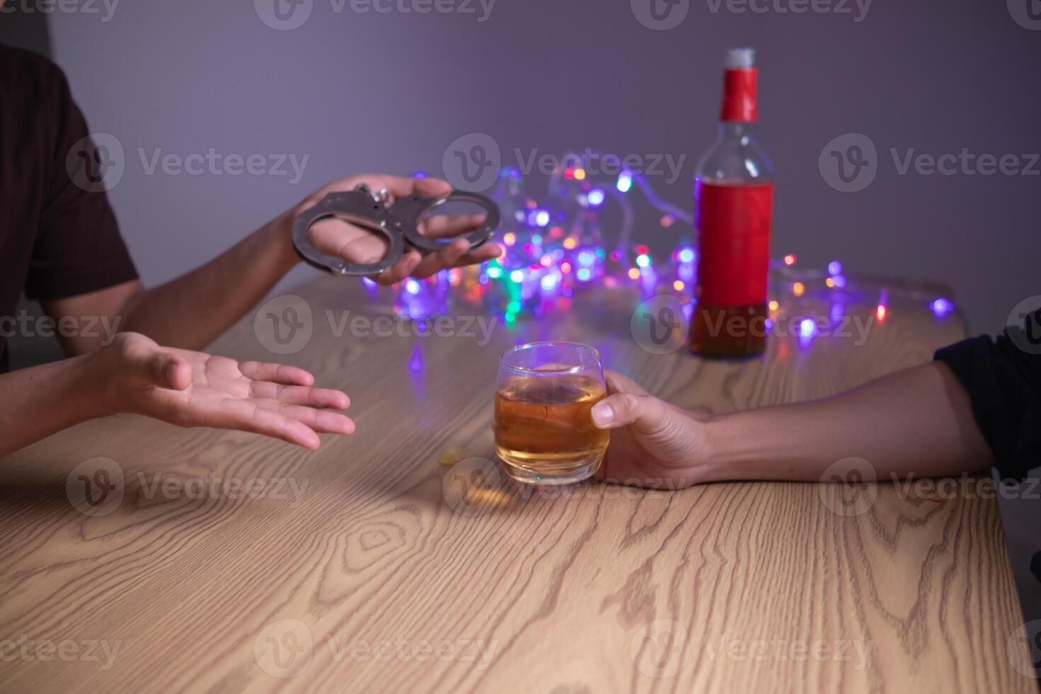 Alcoholic drinks were in goblets and placed on tables within party. Alcohol was consumed by drinkers within party before departed. drinking alcohol in moderation and campaigning against drunk driving. photo
