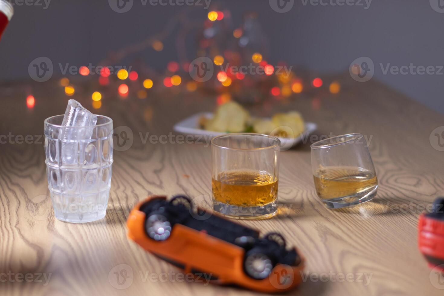 Alcoholic drinks were in goblets and placed on tables within party. Alcohol was consumed by drinkers within party before departed. drinking alcohol in moderation and campaigning against drunk driving. photo