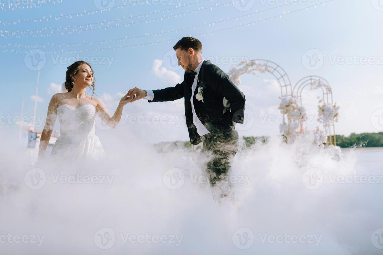the first dance of the bride and groom inside a restaurant photo