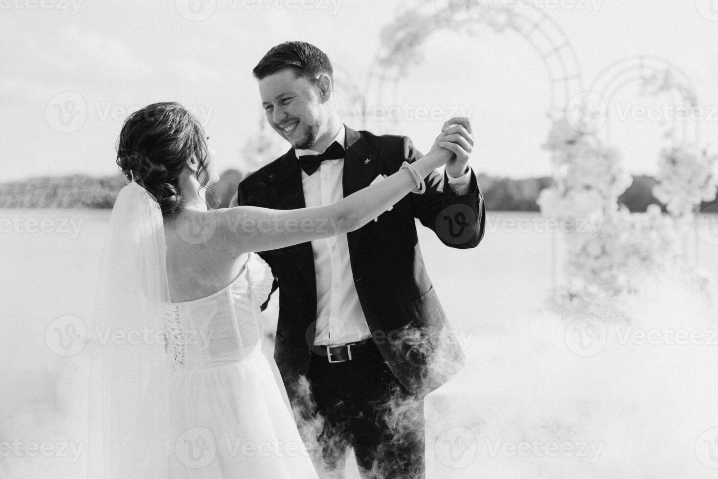 the first dance of the bride and groom inside a restaurant photo