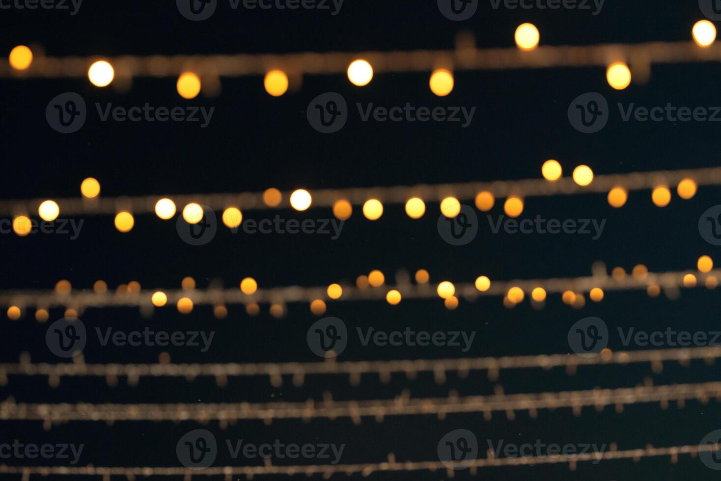 colored blurred bokeh christmas garlands photo