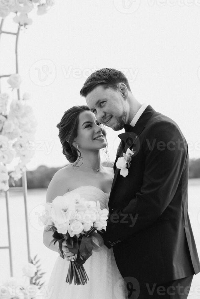 wedding ceremony of the newlyweds on the pier photo