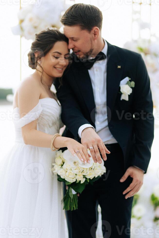 wedding ceremony of the newlyweds on the pier photo