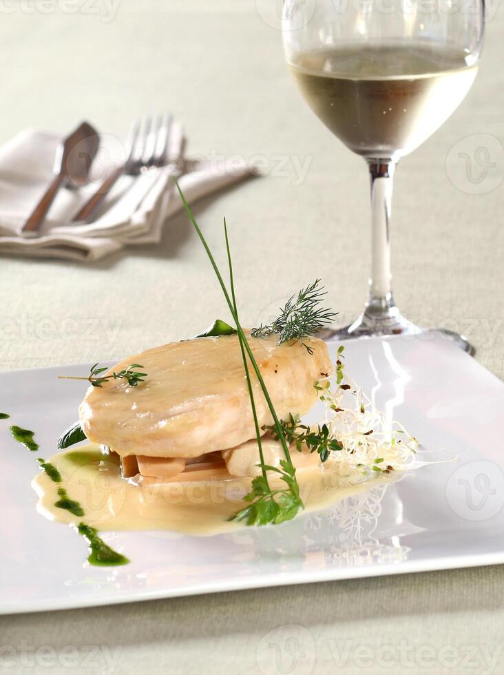 pirarucu fillet in bechamel sauce with hearts of palm photo