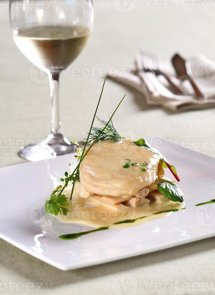 pirarucu fillet in bechamel sauce with hearts of palm photo
