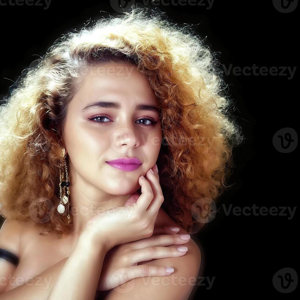 beautiful young woman with curly blond hair on black background photo