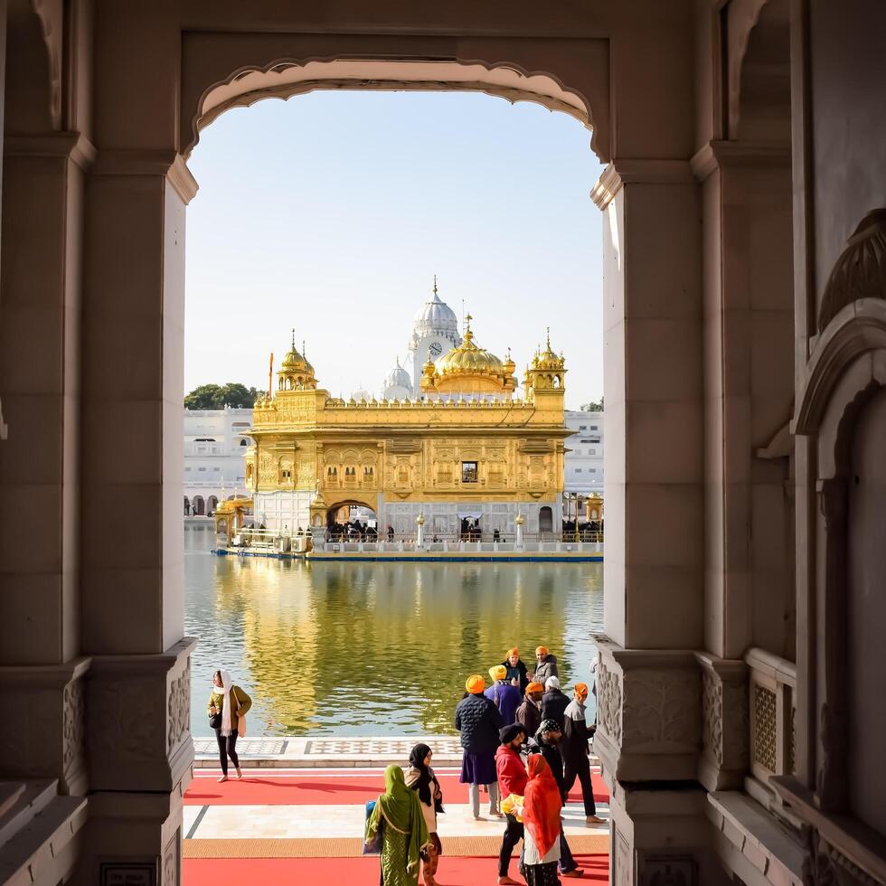 Amritsar, India -June 20 2024 - Unidentified devotees from various parts at Golden Temple -Harmandir Sahib in Amritsar, Punjab, India, Famous indian sikh landmark, Golden Temple photo