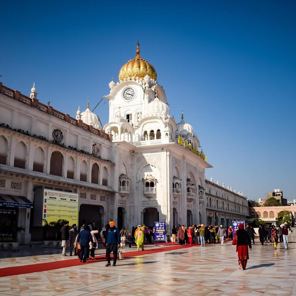 Amritsar, India -June 20 2024 - Unidentified devotees from various parts at Golden Temple -Harmandir Sahib in Amritsar, Punjab, India, Famous indian sikh landmark, Golden Temple photo