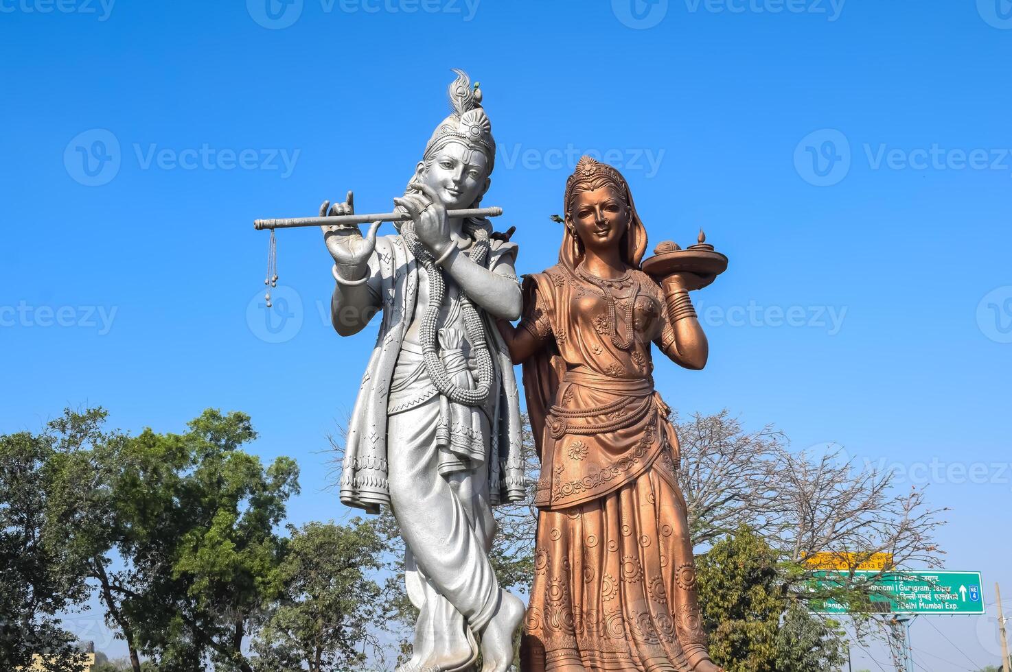 Big statue of Lord Radha Krishna near Delhi International airport, Delhi, India, Lord Krishna and Radha big statue touching sky at main highway Mahipalpur, Delhi photo
