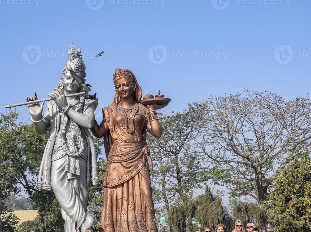 Big statue of Lord Radha Krishna near Delhi International airport, Delhi, India, Lord Krishna and Radha big statue touching sky at main highway Mahipalpur, Delhi photo