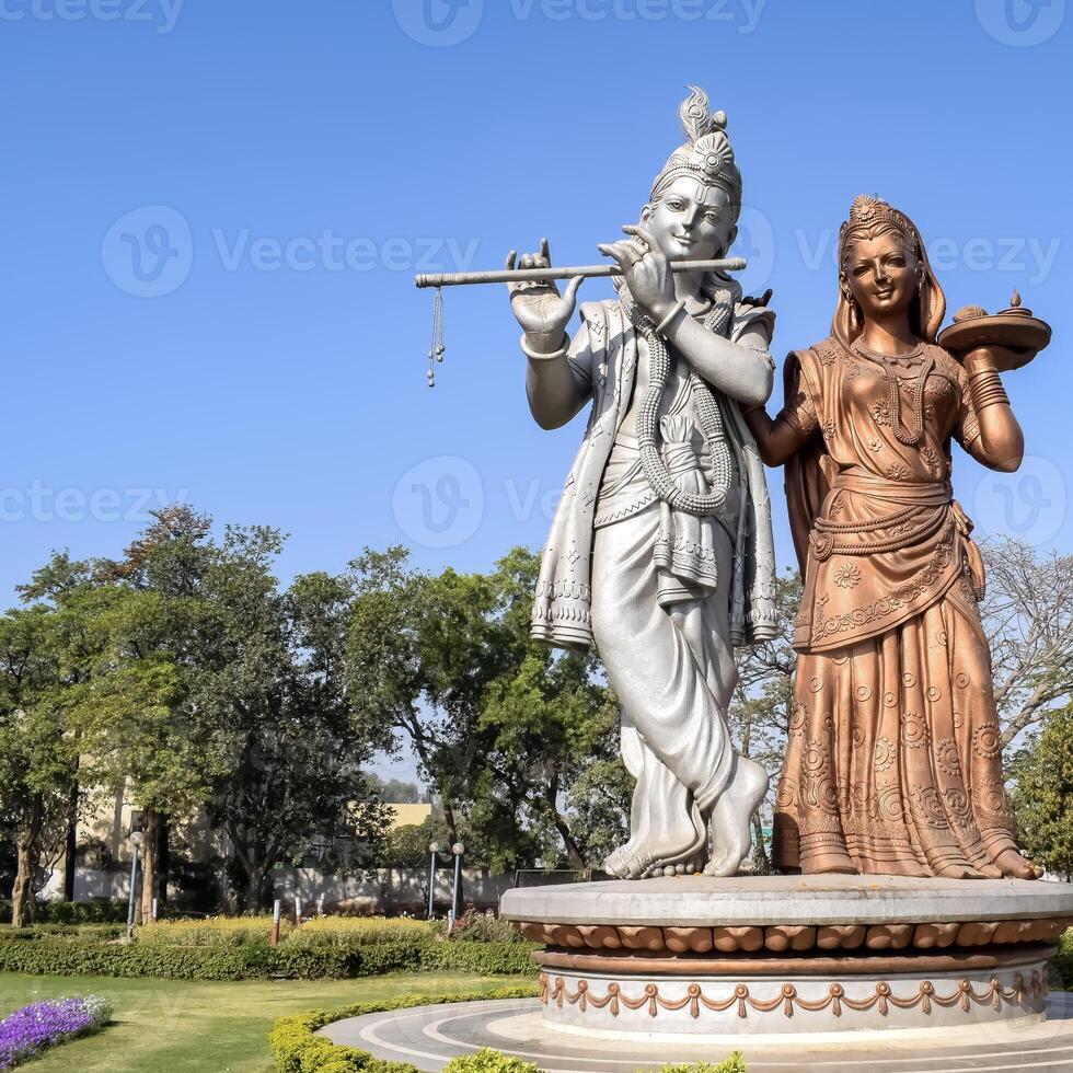 Big statue of Lord Radha Krishna near Delhi International airport, Delhi, India, Lord Krishna and Radha big statue touching sky at main highway Mahipalpur, Delhi photo