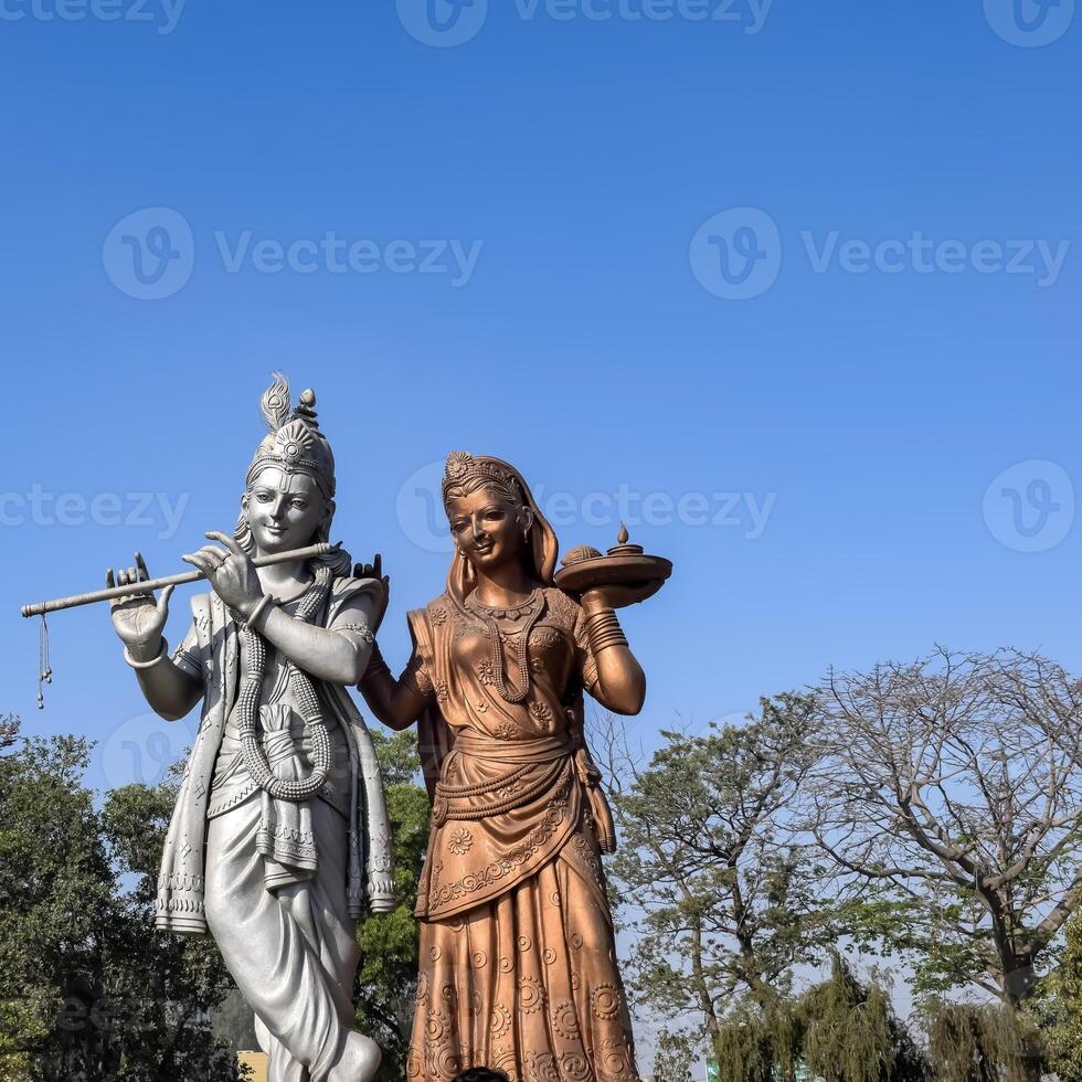 Big statue of Lord Radha Krishna near Delhi International airport, Delhi, India, Lord Krishna and Radha big statue touching sky at main highway Mahipalpur, Delhi photo