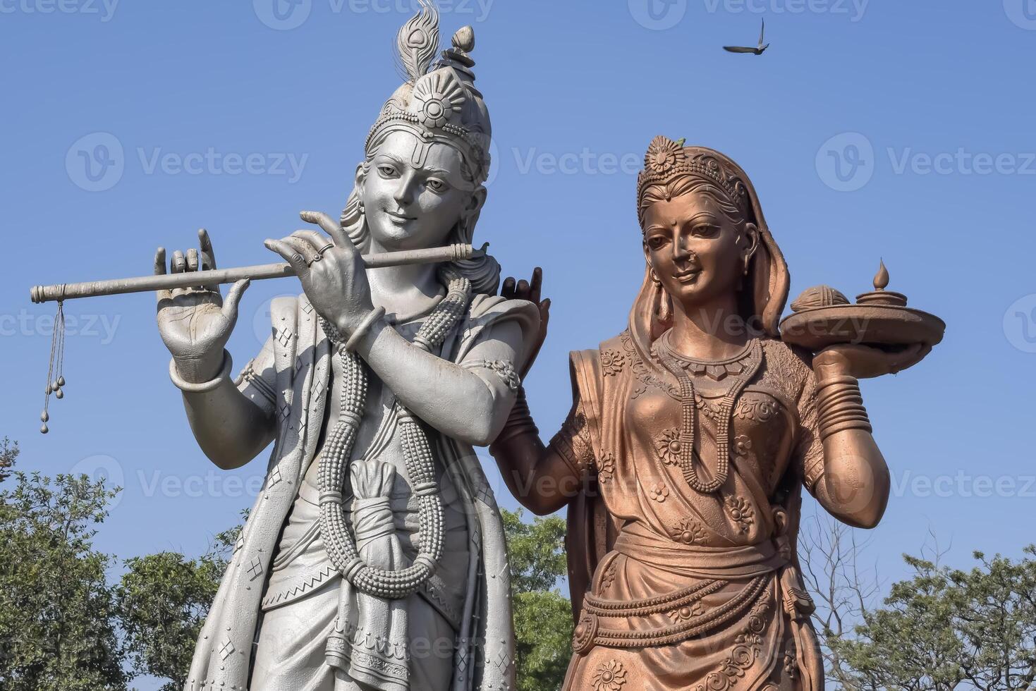 Big statue of Lord Radha Krishna near Delhi International airport, Delhi, India, Lord Krishna and Radha big statue touching sky at main highway Mahipalpur, Delhi photo