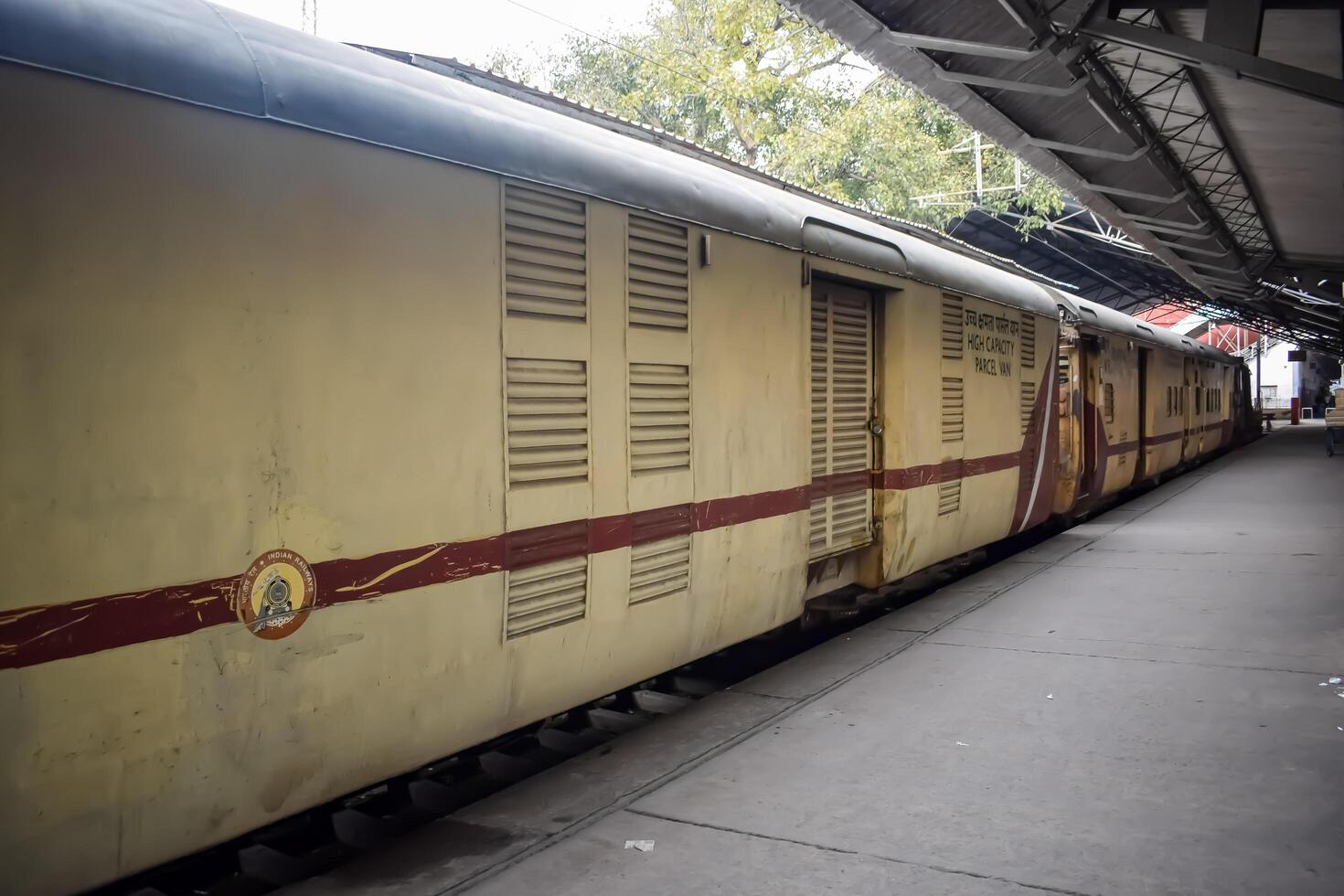 Amritsar, India, June 03 2024 - Indian railway train at Amritsar railway station platform during morning time, Colourful train at Amritsar, Punjab railway station photo