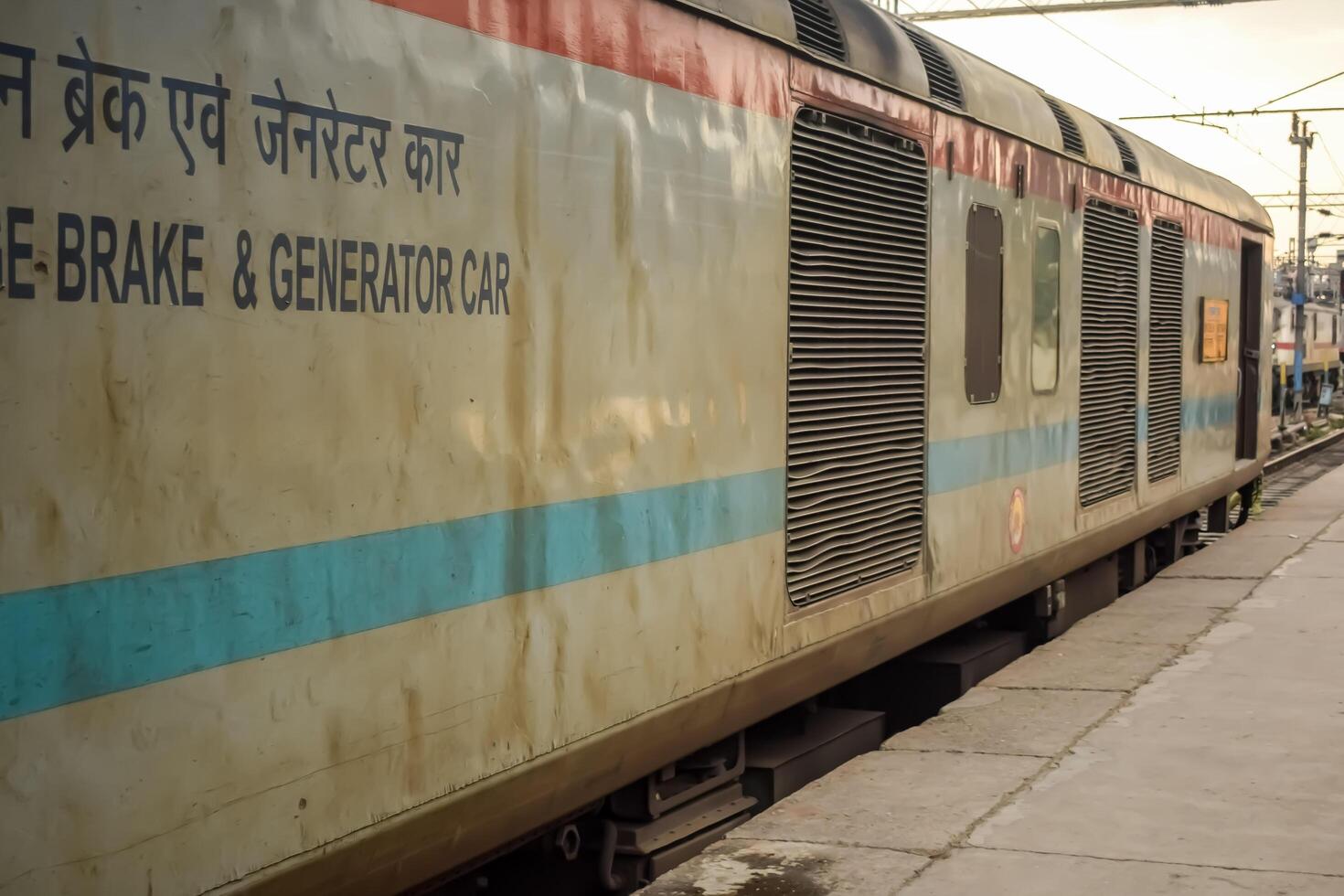 Amritsar, India, June 03 2024 - Indian railway train at Amritsar railway station platform during morning time, Colourful train at Amritsar, Punjab railway station photo