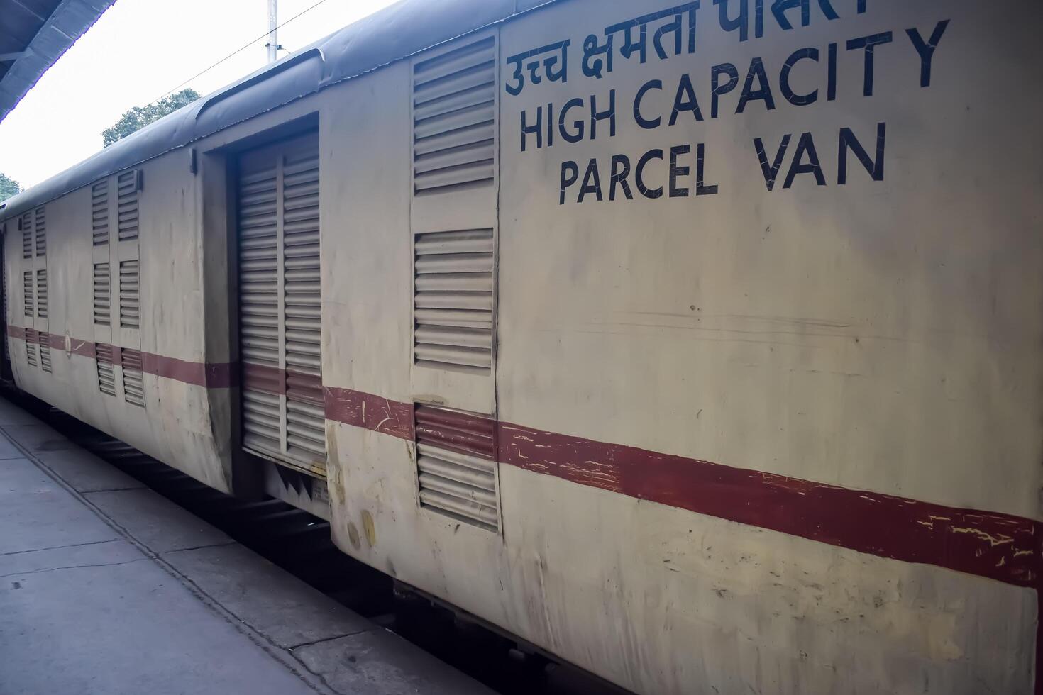 Amritsar, India, June 03 2024 - Indian railway train at Amritsar railway station platform during morning time, Colourful train at Amritsar, Punjab railway station photo