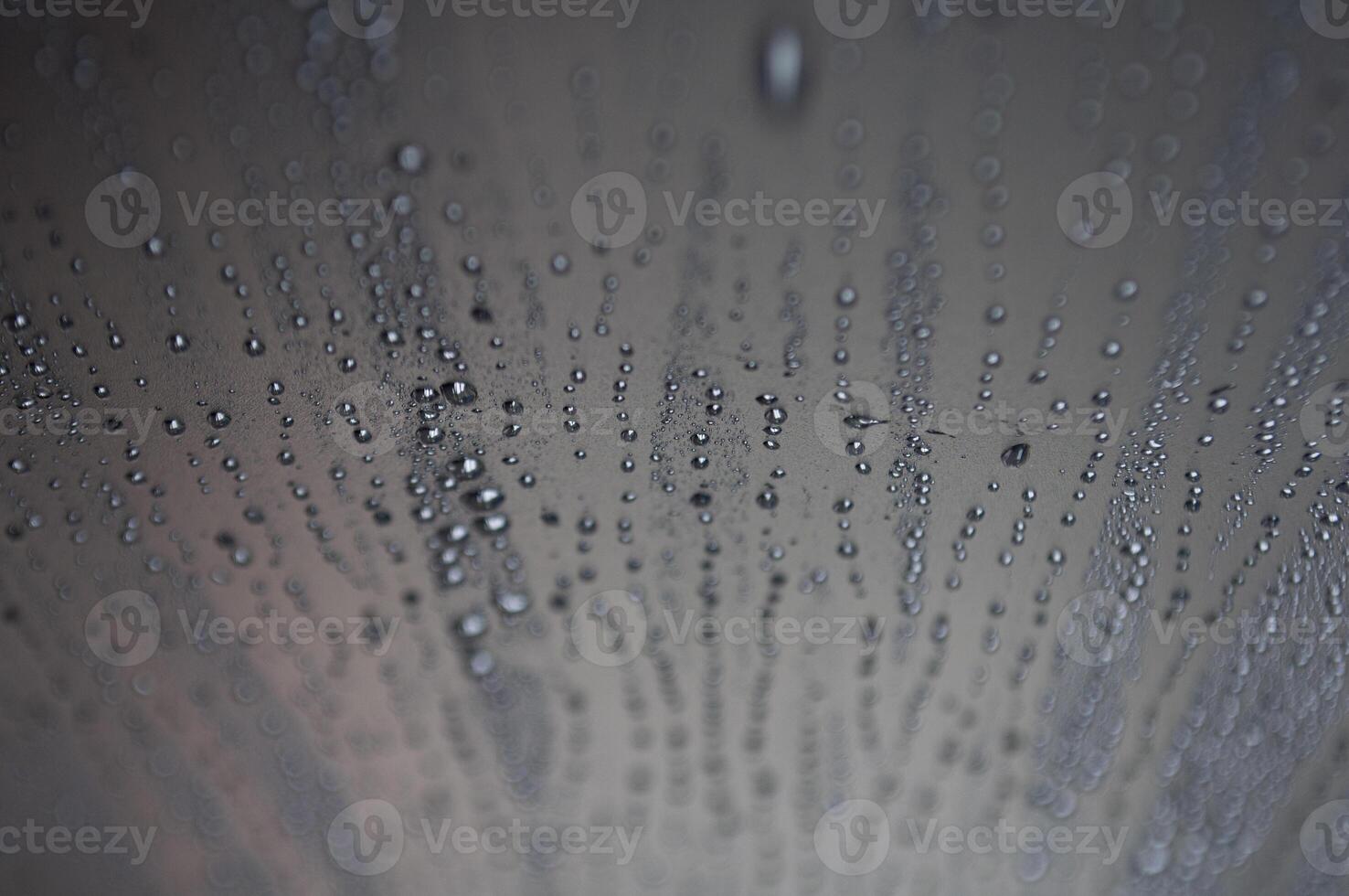 Clear top view of water droplets from rain suitable for design or wallpaper background photo