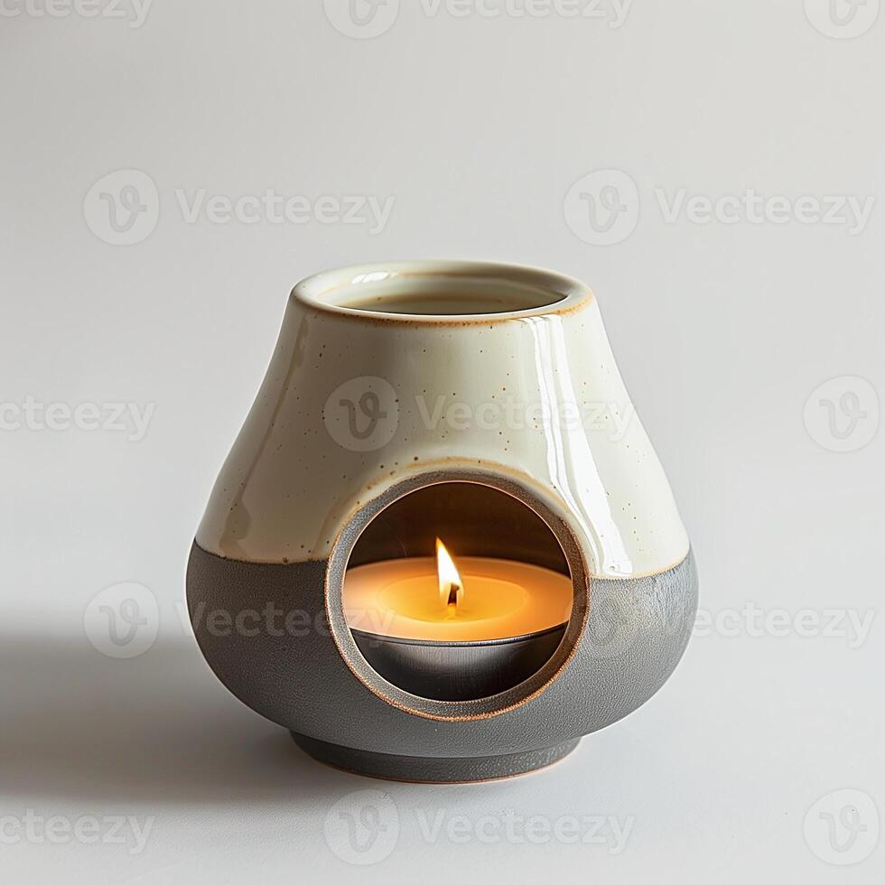 Modern style ceramic diffutholder with opening hole for candle. photo