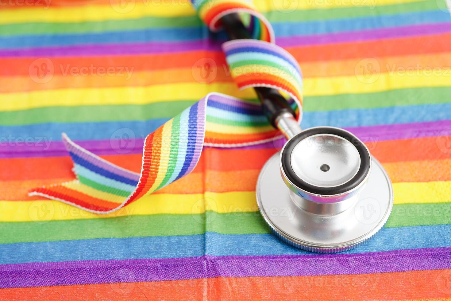 LGBT symbol, Stethoscope on rainbow flag, rights and gender equality, LGBT Pride Month in June. photo