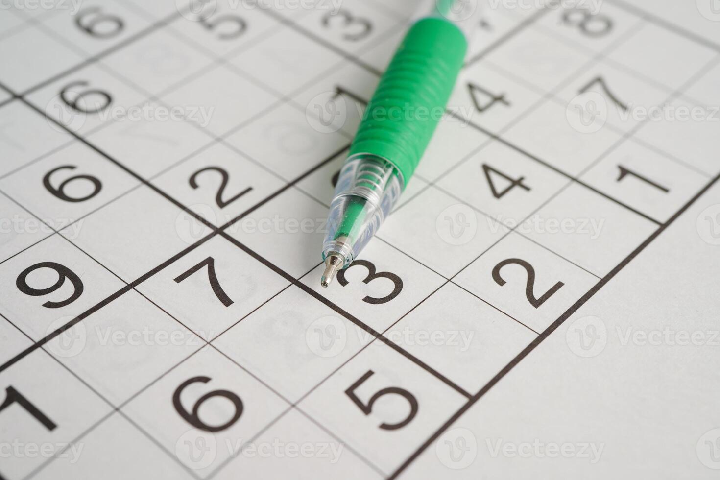 Sudoku puzzle, game to play for keep you brain younger for developing Alzheimer disease in senior patient. photo