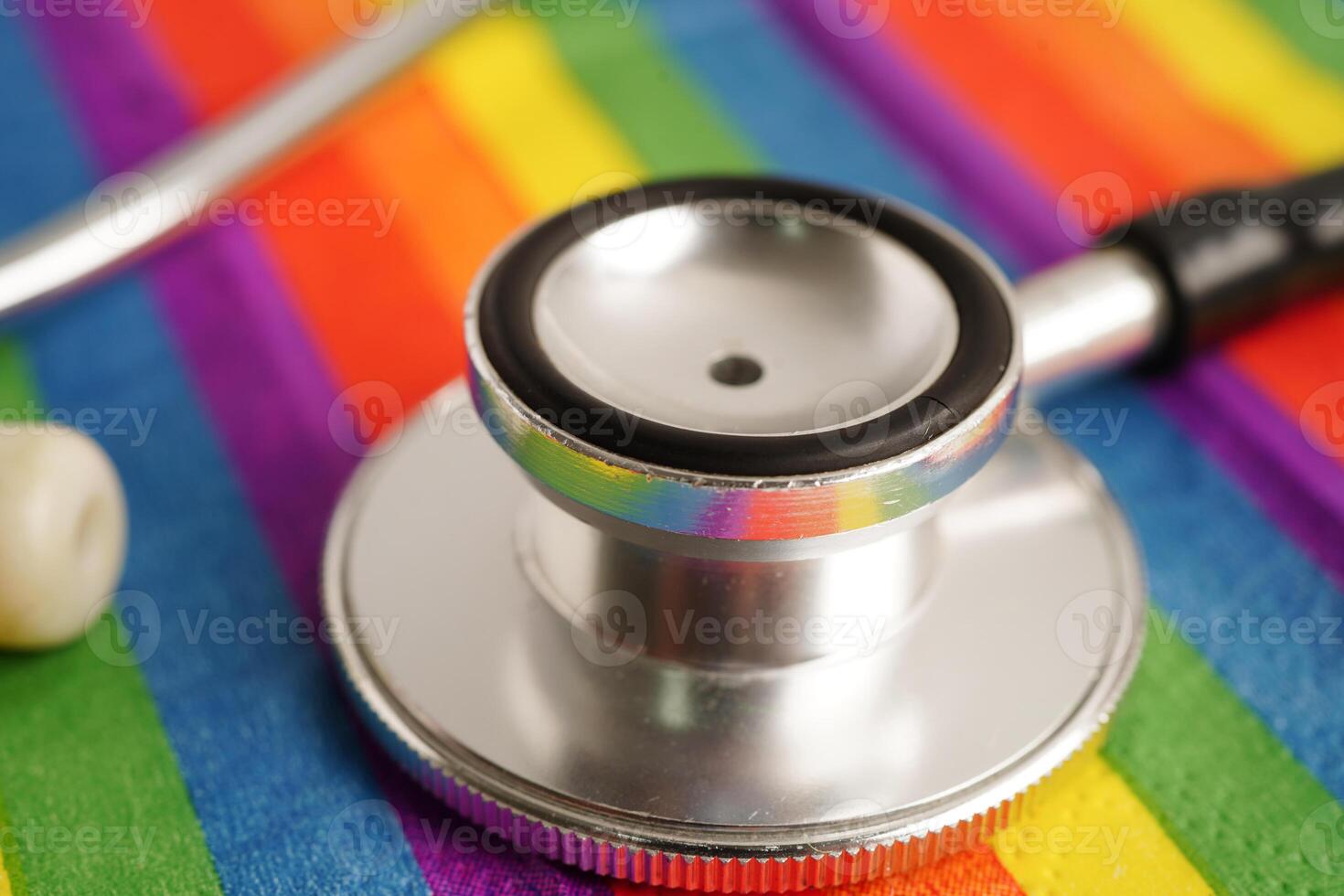 LGBT symbol, Stethoscope on rainbow flag, rights and gender equality, LGBT Pride Month in June. photo