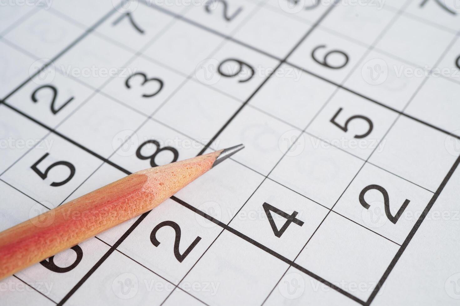 Sudoku puzzle, game to play for keep you brain younger for developing Alzheimer disease in senior patient. photo